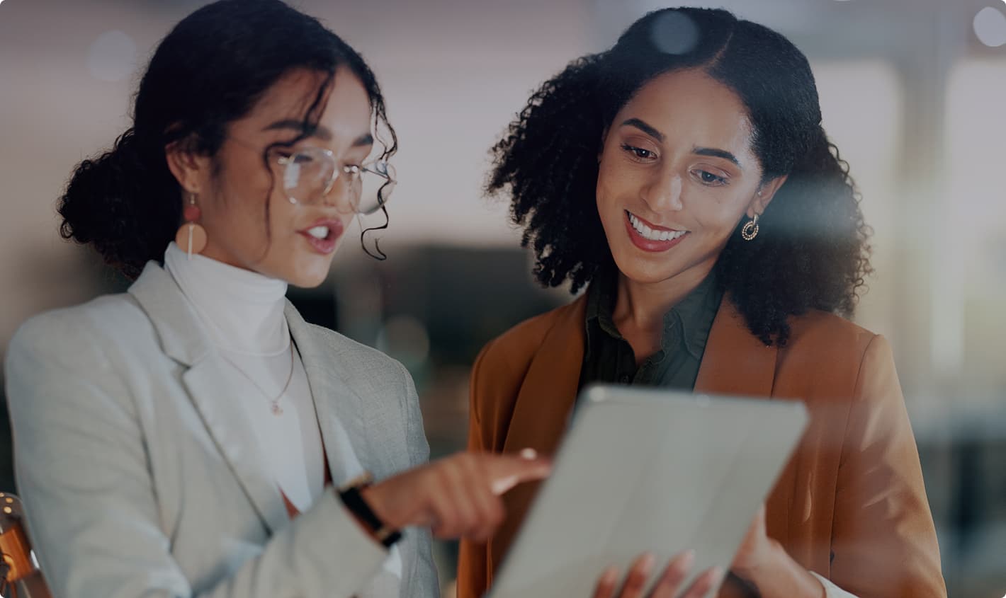 Woman with hijab working on laptop